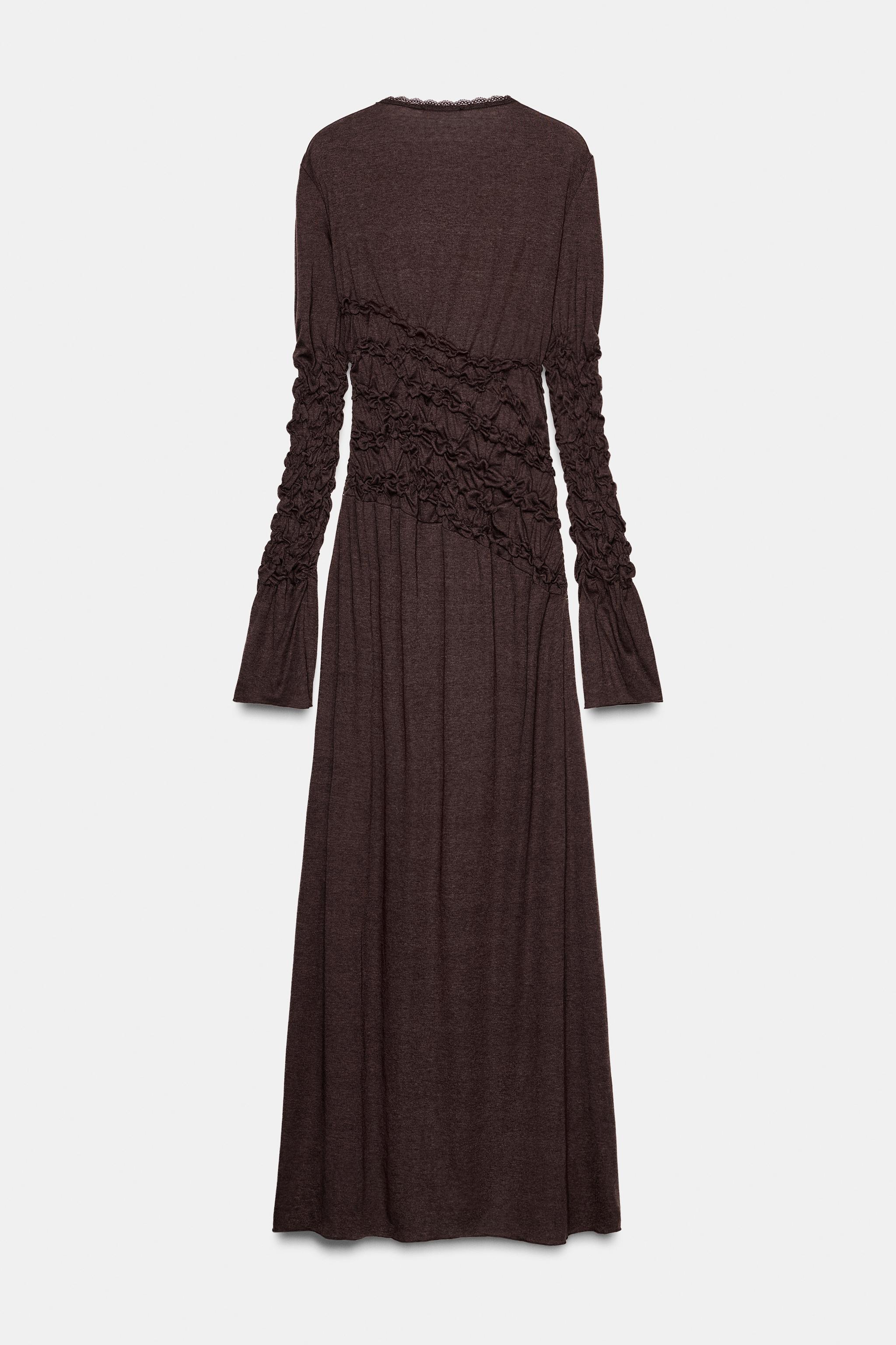 ROBE MI-LONGUE À PLIS